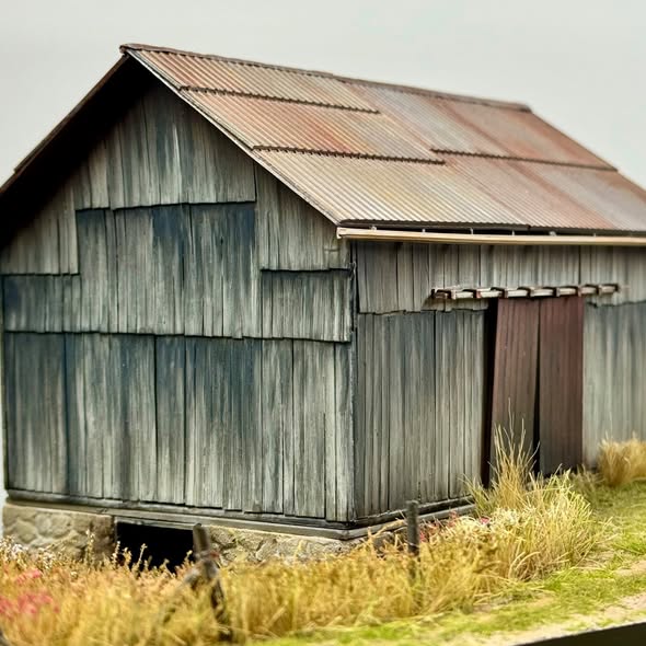 A model of an Ontario barn built circa 1890 that my family owned as a child. Entirely built from scratch and painted by hand.